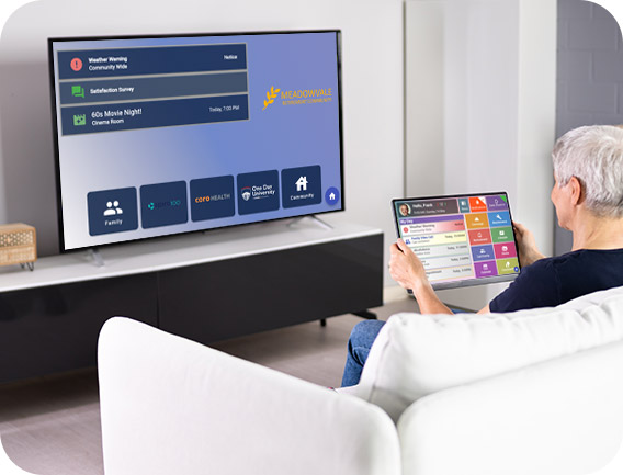 elderly using ResHub app from tablet through a tv